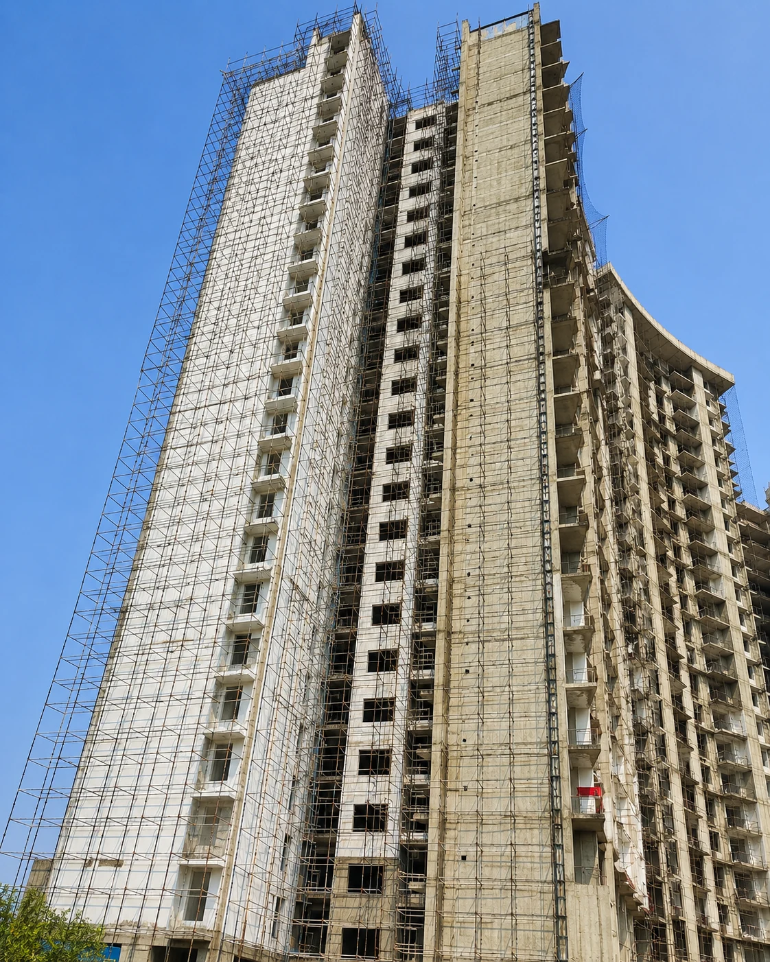 26-storey commercial building with scaffolding near Ekana Stadium in Lucknow